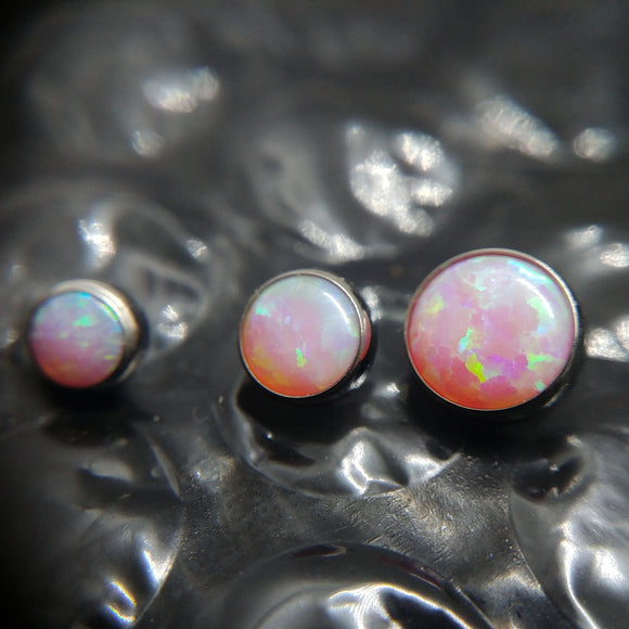 rosa opal piercing