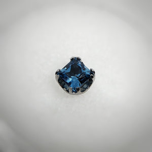 Princess-cut blue zircon end by Anatometal