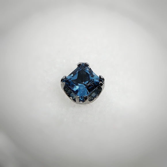 Princess-cut blue zircon end by Anatometal