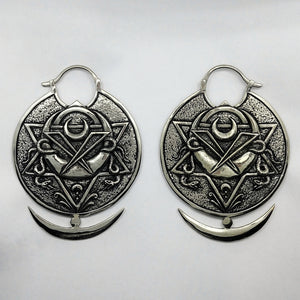 earweights with crescent moon and snake sigil