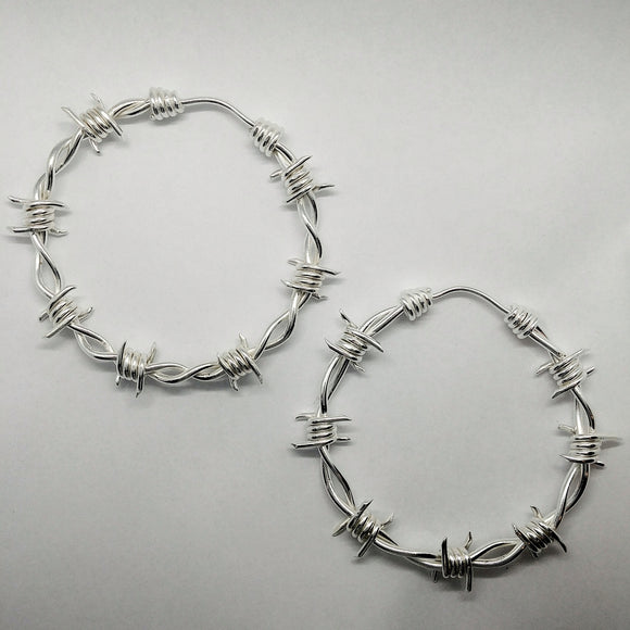 Barbed-wire earrings by Symmetry Jewelry