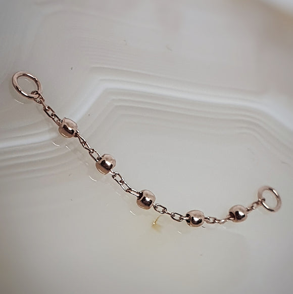 rosegold piercingchain with beads